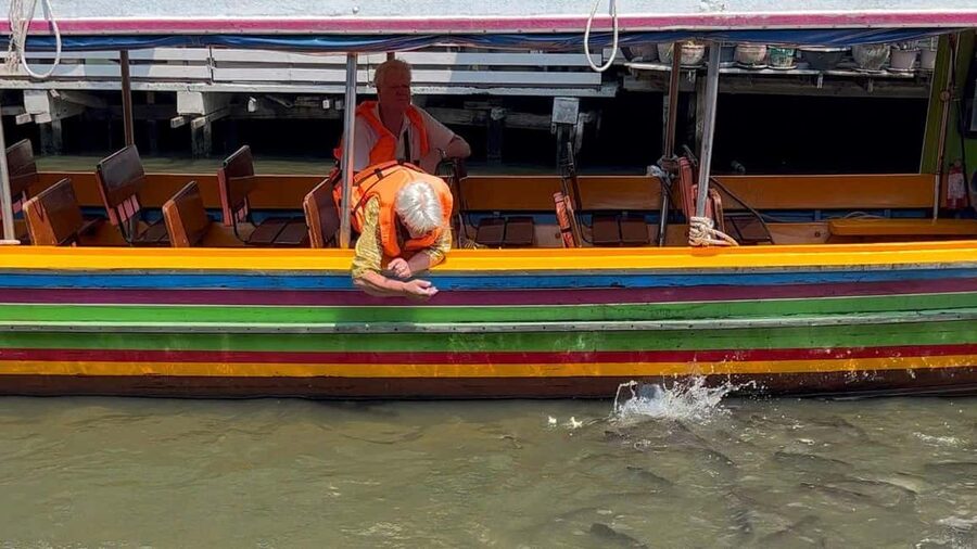 1 Hr Private Bangkok Canal Boat Tour: Traditional Flat Boat - Fish Feeding and the Small Touches That Make It Work