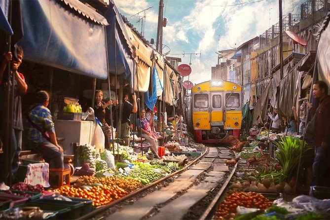 Amphawa Floating & Maeklong Railway Train Market (Small Group) - Wat Bang Kung: Banyan Roots, Soldier Statues, and a Slower Pace