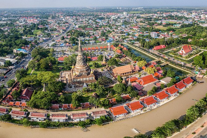 Ancient Wonders of Ayutthaya with Return Scenic River Cruise - Bangkok to Ayutthaya: River City Check-In and an Air-Conditioned Ride