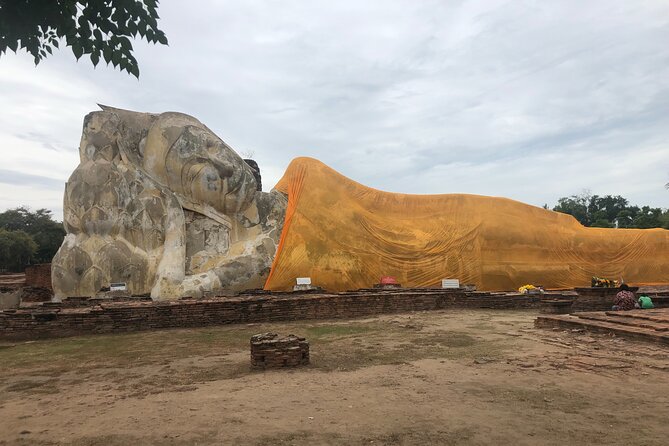 Ayutthaya Day Tour By Coach and Cruise - Wat Lokayasutharam (Temple of the Reclining Buddha): scale you’ll feel in your body