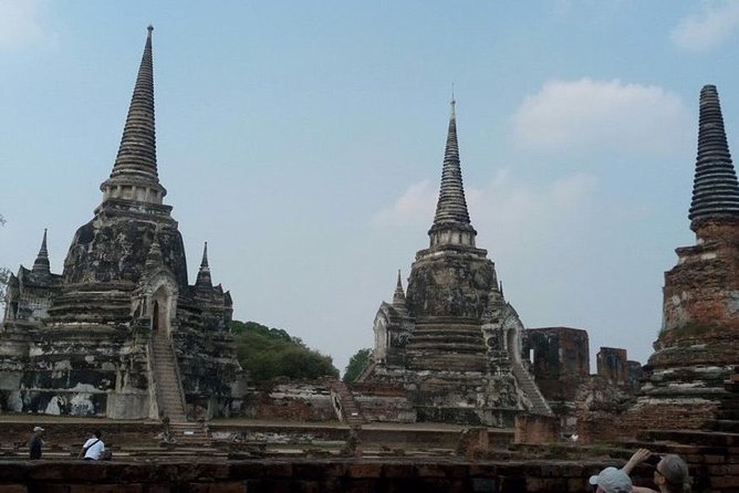 Ayutthaya Guided UNESCO Heritage Tour Including Lunch & Transfers - Wat Mahathat: the tree roots and the Buddha head photo you came for