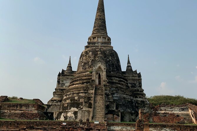 Ayutthaya Sunset Join Tour, Boat Ride, Famous Spot & Local Market - Wat Mahathat: The Temple Ruins That Still Feel Sacred