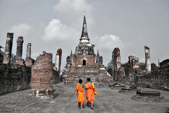 Ayutthaya Sunset Tour: Iconic Temples & Scenic River Boat Ride - Wat Chaiwatthanaram: riverside symmetry at late afternoon