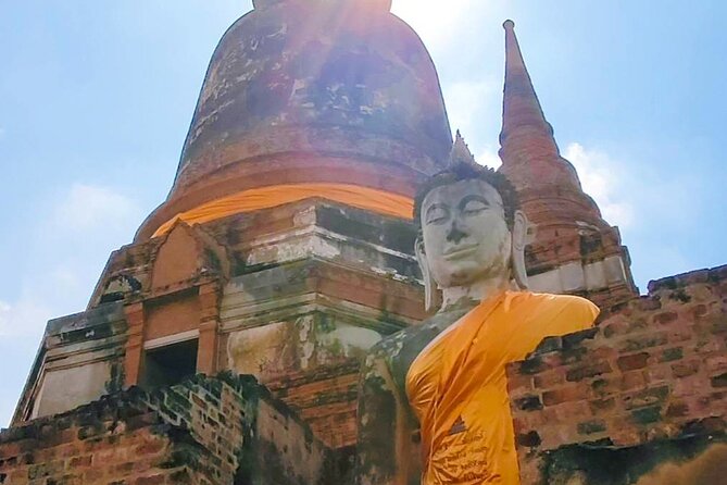 Ayutthaya UNESCO World Heritage Day Tour: Royal Treasures of Siam - Wat Mahathat: the Bodhi tree Buddha head that people remember