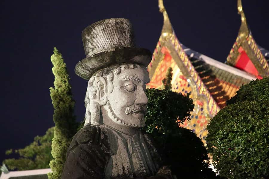 Bangkok at Sunset 5-Hour Bike Tour - Wat Arun at night: the Temple of Dawn from the riverside route