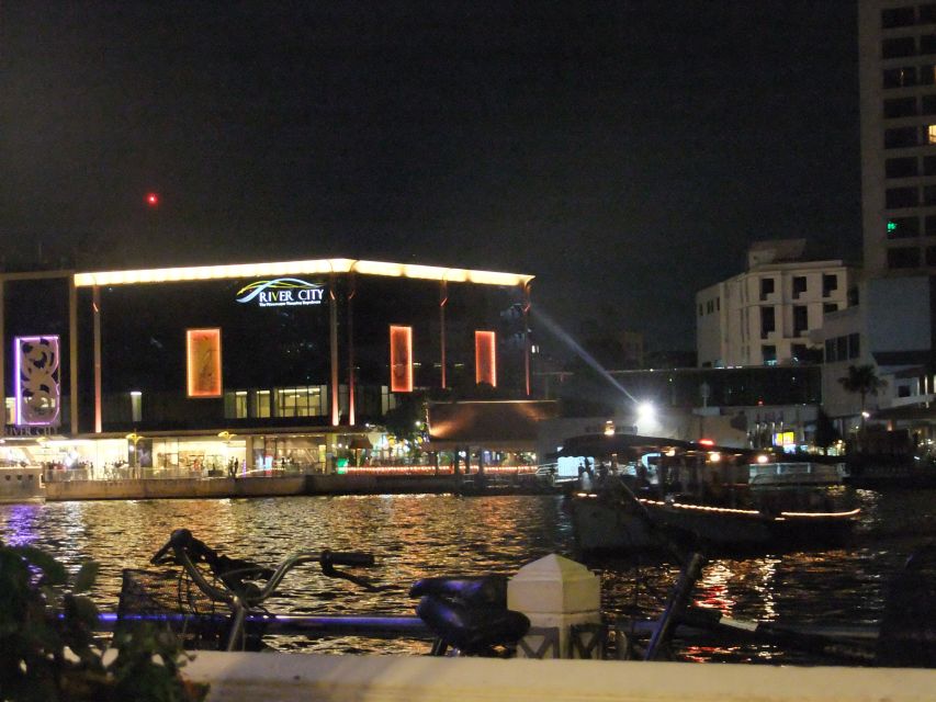 Bangkok by Night Cycling Tour with Street-food Meal - Crossing the Chao Phraya by pedestrian ferry: the view shift you’ll feel