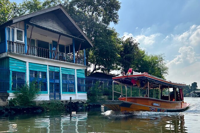 Bangkok Canal Shared Cruise by Longtail Boat - Floating village time: seeing life built for water