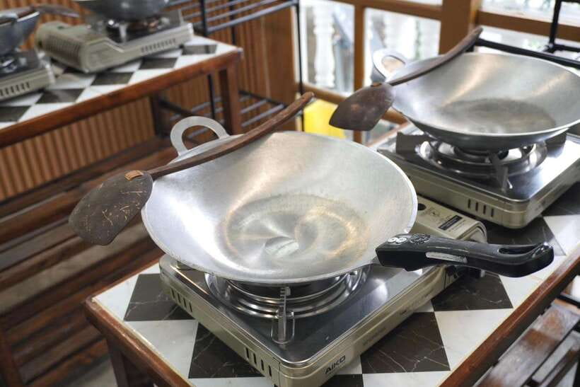 Bangkok Cooking Class : Traditional Thai dishes&Market Trip - The Kitchen Setup at Sala Thai BKK: Tools, Apron, and Clear Coaching