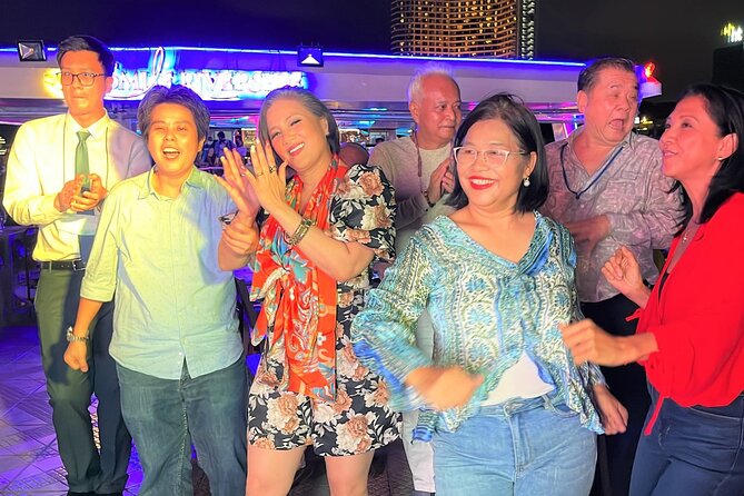 Bangkok Dinner Cruise with Intl Buffet, Live Music & Hotel Pickup - Temple spotting from the water: Wat Pho, Wat Arun, and the Grand Palace