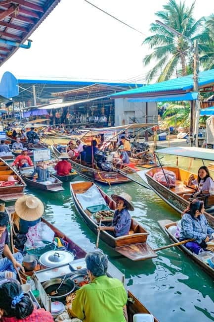 Bangkok: Famous Markets and Dragon Temple Guided Day Tour - Maeklong Railway Market: The Moment the Stalls Pull Back