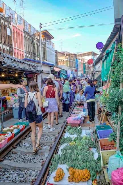 Bangkok: Famous Markets and Dragon Temple Guided Day Tour - Damnoen Saduak Floating Market: Boat Ride and Boat-to-Boat Energy