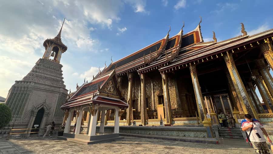 Bangkok: Kid On Tour Grand Palace and Emerald Buddha - The Grand Palace inside look: murals, Buddhas, and a special bell