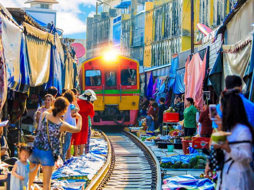 Bangkok: Maeklong Railway & Amphawa Floating Market Day Trip - Maeklong Railway Market: One train, one shot for photos