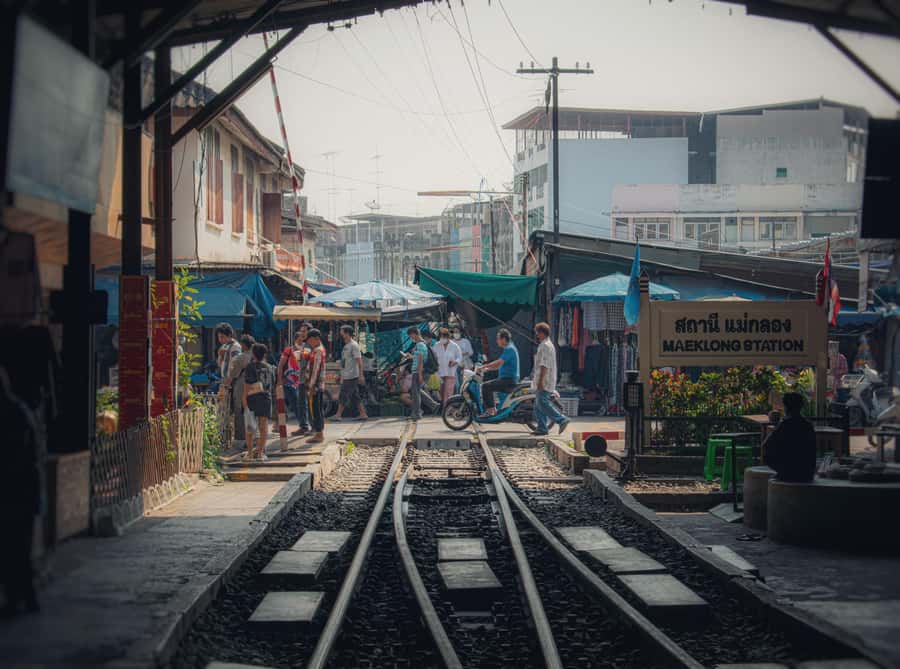 Bangkok: Maeklong Train Market & Amphawa Floating Market - Maeklong Railway Market: Watching the Train Interrupt Shopping