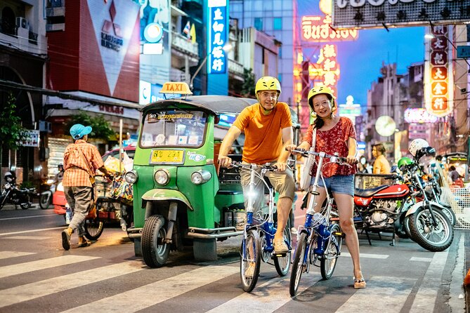 Bangkok Night Bike Tour -Hotel-pickup & Dinner - Thai dinner and a rooftop bar drink: where the evening payoff lands