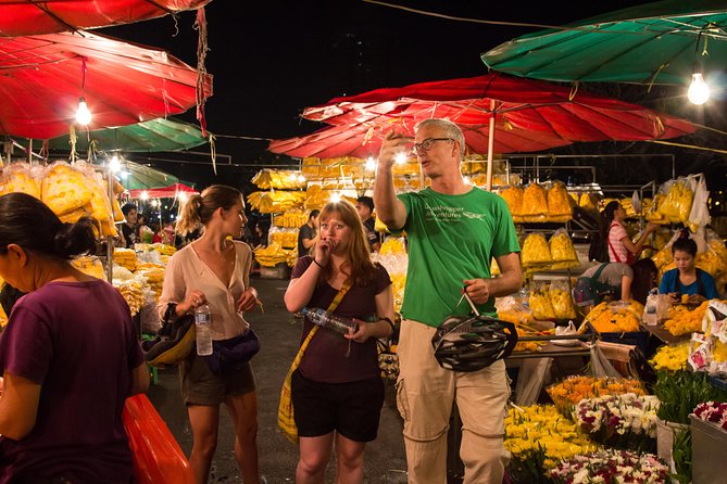 Bangkok: Night Bike Tour with Temples & Flower Market Visit - Ferries and Rama VIII Bridge: views that slow you down