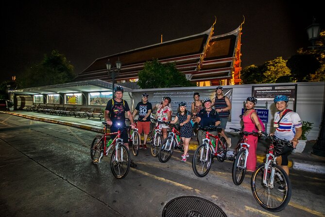 Bangkok: Night Bike Tour with Temples & Flower Market Visit - Grand Palace area by bike: golden rooftops without the daytime crush