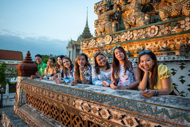 Bangkok Night Tour: Wat Arun, Wat Pho, Chinatown & Tuk Tuk Ride - Wat Pho after sunset: the reclining Buddha and temple etiquette
