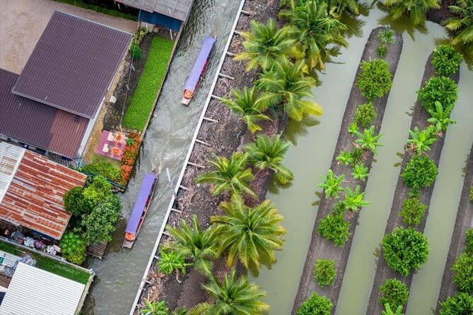 Bangkok: Railway & Damnoen Saduak Floating Market with Transfer - Mae Klong Railway Market (Talad Rom Hoop): How the Train Changes Everything