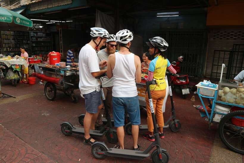 Bangkok: Riverside E-Scooter Adventure with StreetFood Snack - The river crossings: why bridge plus ferry is a smart combo