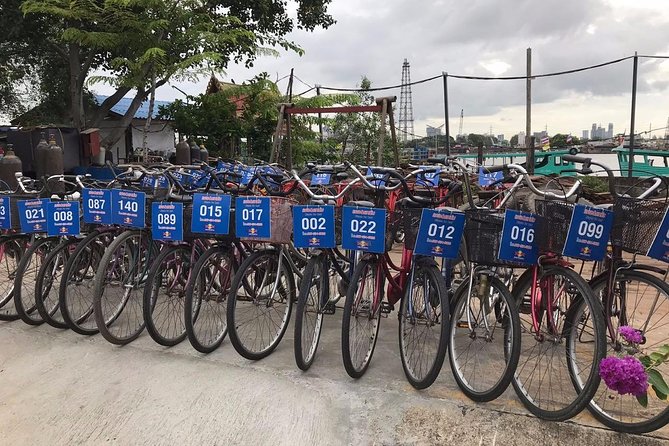 Bangkok's Green Lung Jungle Cycling Adventure Tour - Khlong Toei Market: Real Bangkok food and local rhythm