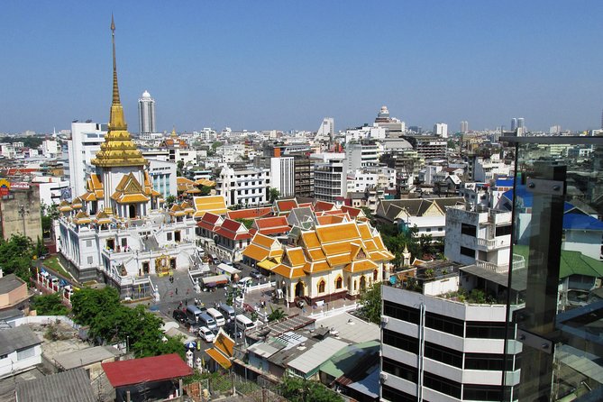 Bangkok’s Sacred Temples & Local Culture Half-Day Tour - Stop 2: Wat Pho, the Chinatown Drive, and the Reclining Buddha