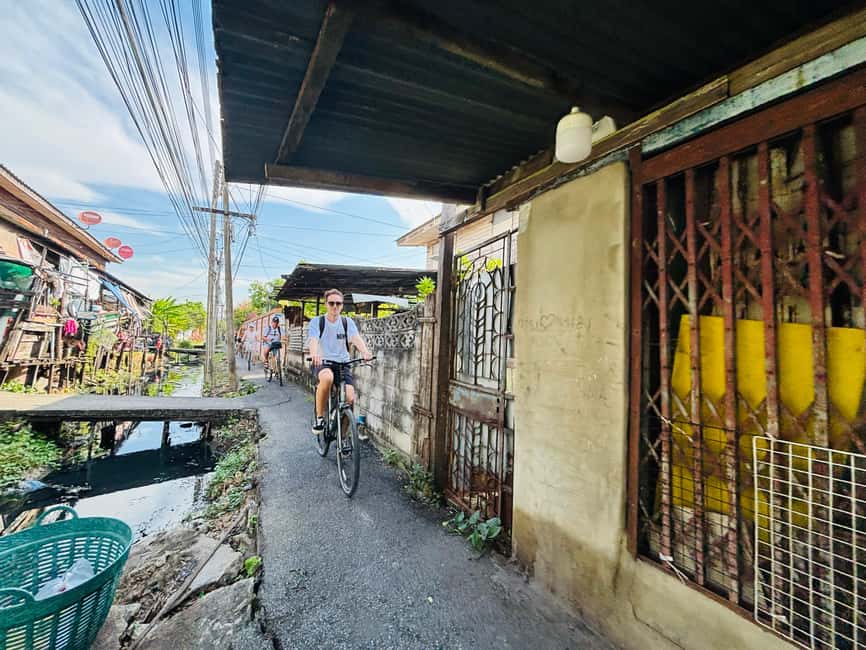 Bangkok: Temples, Canals & Local Life Bike Tour - Meeting Candbike Bangkok Tours and starting smoothly