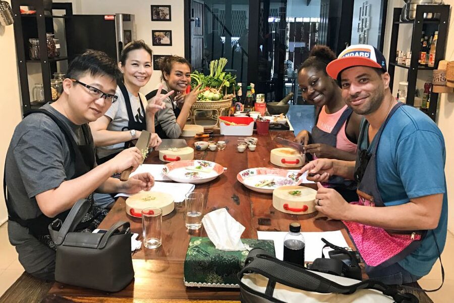Bangkok: Thai Cooking Class and Onnuch Market Tour - Pink Chili Thai Cooking School sets the tone