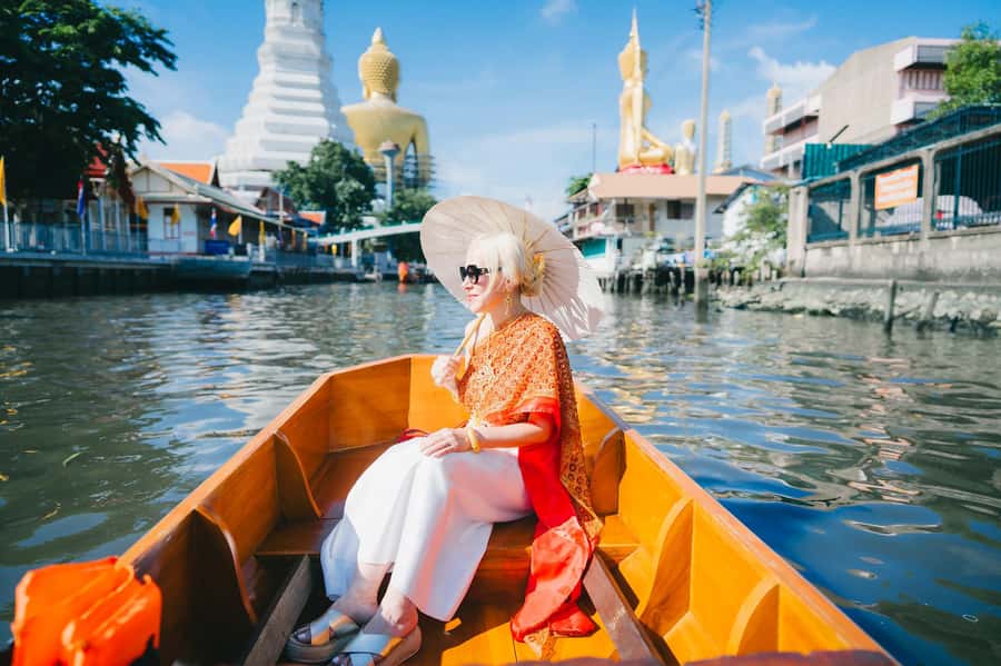 Bangkok:Thai costume with Long tail boat photoshoot - Model Thai Style start: costume choice, changing, and getting photo-ready