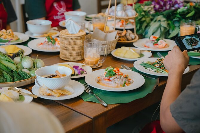 Bangkok Udomsuk Thai Cooking Class with local market tour - Back in the kitchen with a pro chef-instructor