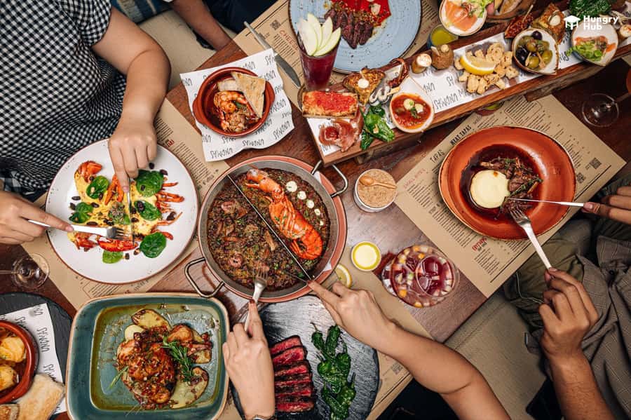 Bangkok: UNO MAS at Centara Grand Central World - What You’ll Eat: Tapas, Seafood Paella, and the Roasted Pig Show