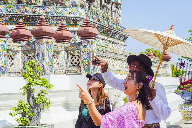 Bangkok Wat Pho and Flower Market Historical Walking Tour - A boat ride that changes the angle on Wat Arun