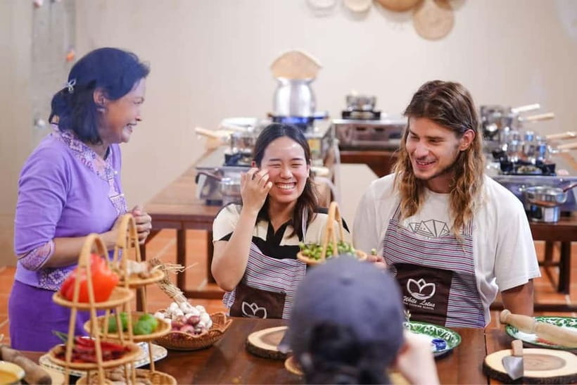 Bangkok: White Lotus Thai Cooking Class with Market Tour - Finding White Lotus Thai Cooking School in Paak Klong Talad