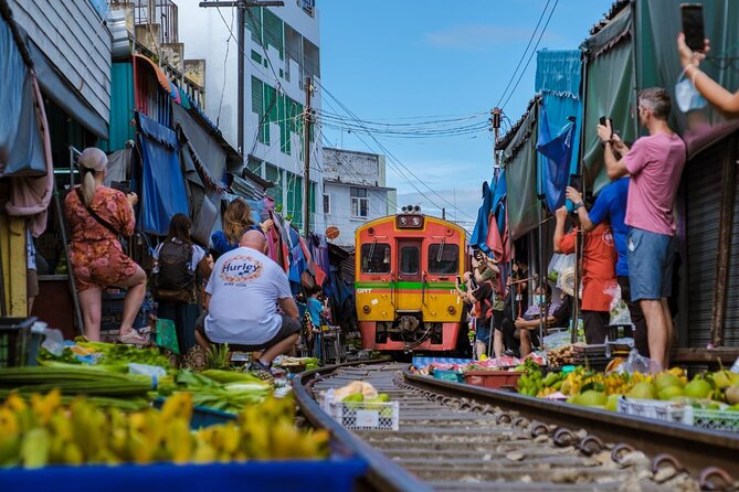 Damnoen Saduak Floating Market & Ayutthaya Tour from Bangkok - Mae Klong Railway Market: the train spectacle you can’t fake