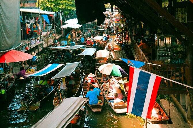 Damnoen Saduak Floating Market & Maeklong Railway Market Tour From Bangkok - Damnoen Saduak Floating Market from a long-tail boat