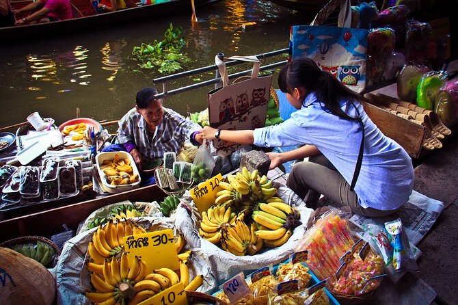 Damnoen Saduak Floating Market & Maeklong Railway Market Tour From Bangkok - Guide and group size: easier than DIY, not a crowd crush