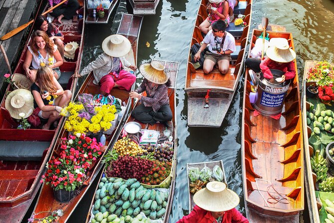 Damnoen Saduak Floating Market & Maeklong Railway Market Tour From Bangkok - Maeklong Railway Market and the horn-and-hurry routine
