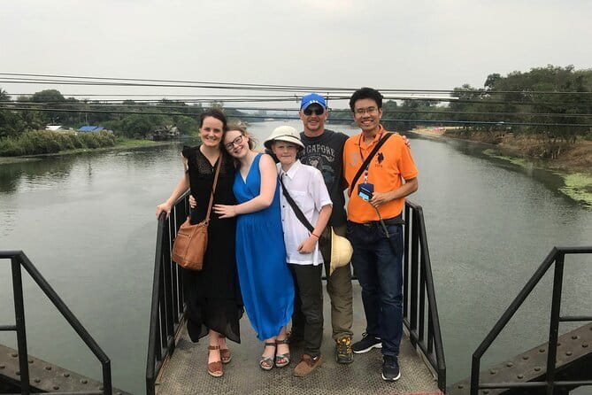 Floating and Railway Markets and Erawan Waterfall (Group Tour) - Mae Klong Railway Market (Hoop Rom Market): Watching the Train Change the Rules