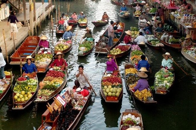 Floating Market Damnoen Saduak and Meklong Railway Market: Half Day Tour - Trading Bangkok Traffic for Two Market Worlds