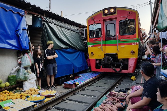 Floating Market Damnoen Saduak and Meklong Railway Market: Half Day Tour - Damnoen Saduak Floating Market: Boat Ride, Then Canal-Bank Wandering