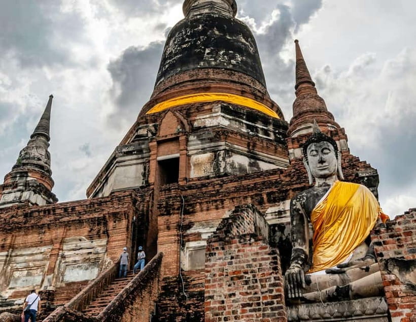 From Bangkok: Ayutthaya Heritage Tour with Sunset Boat Ride - Wat Yai Chai Mongkhon: chedi scale and that reclining Buddha moment