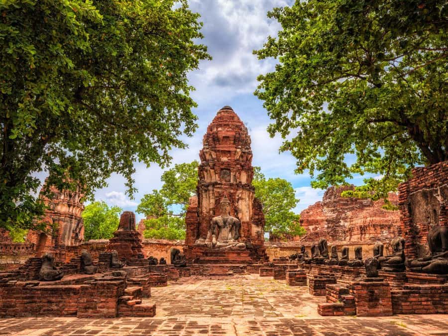 From Bangkok: Ayutthaya Temples and Boat Tour with Lunch - Wat Phra Sri Sanphet and Wat Mahathat: royal power and a symbol of nature