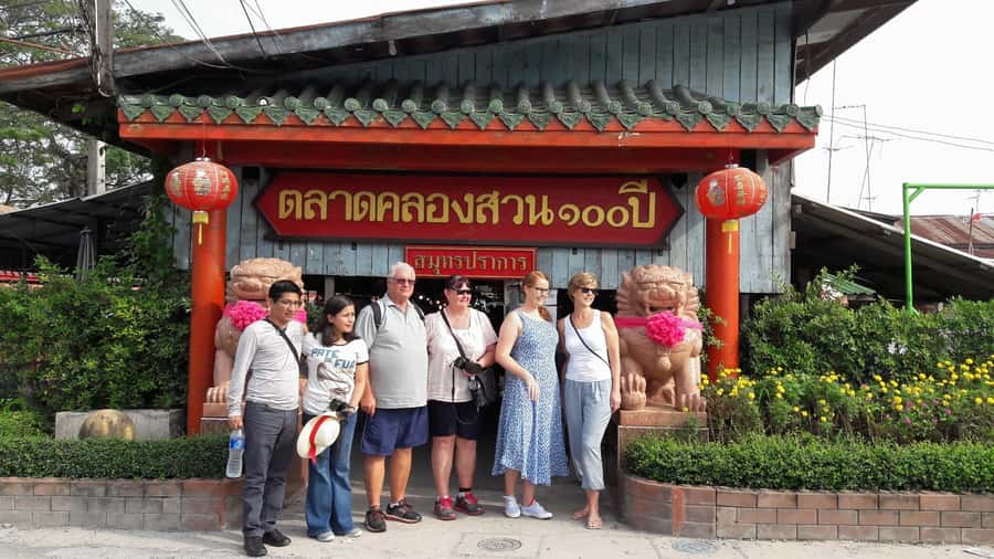 From Bangkok: Chachoengsao Tour and Bang Pakong River Cruise - Bang Pakong River cruise: long-tail boat calm over agricultural Chachoengsao