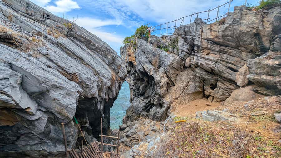 From Bangkok: Day Tour Koh Sichang Island with Tuktuk Tour - Buddha Footprint Views and the Crescent-Moon Bay