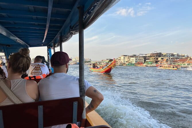 From Bangkok: Kanchanaburi, River Kwai and Erawan Waterfall Tour - Wat Tham Sua (Tiger Cave Temple): steps, caves, and big views