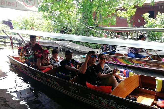 Full-Day Floating Market and Maeklong Railway Market Private Tour from Bangkok - Damnoen Saduak by long-tail boat: canal views before the crowd