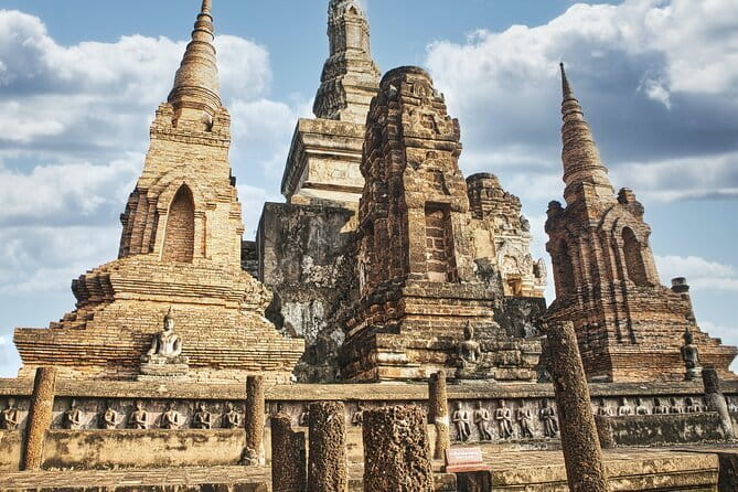 Glittering Ayutthaya Tour to Famous Sights, Market & Sunset Boat - Wat Yai Chaya Mongkol: chedi views and a reclining Buddha