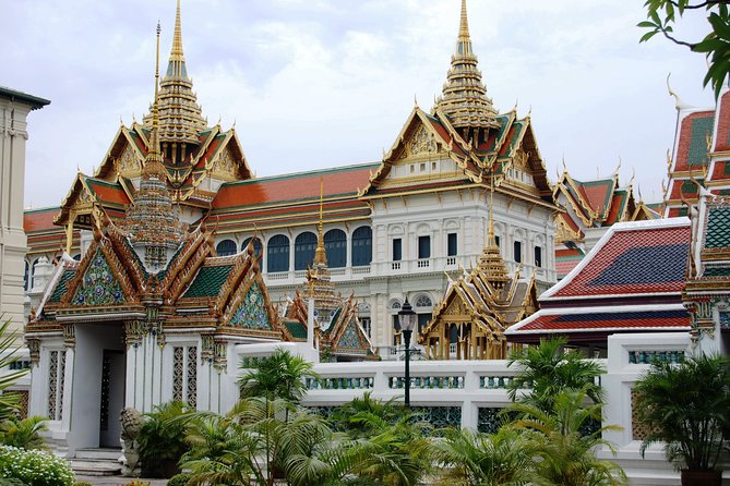 Grand Palace Glory and Emerald Buddha : Half-Day Tour in Bangkok - Wat Phra Kaew and the Emerald Buddha: Sacred Rules That Matter