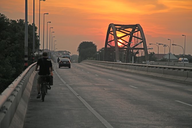 Half-Day Ayutthaya Sunset Bicycle Excursion - Chao Phrom Market: snack stop for sweet Muslim bites and spicy nám prík