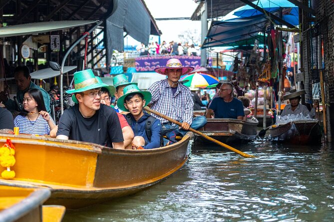 Half Day Railway Market and Damnoen saduak Floating Market tour - Mae Klong Railway Market: watching shops move when a train appears